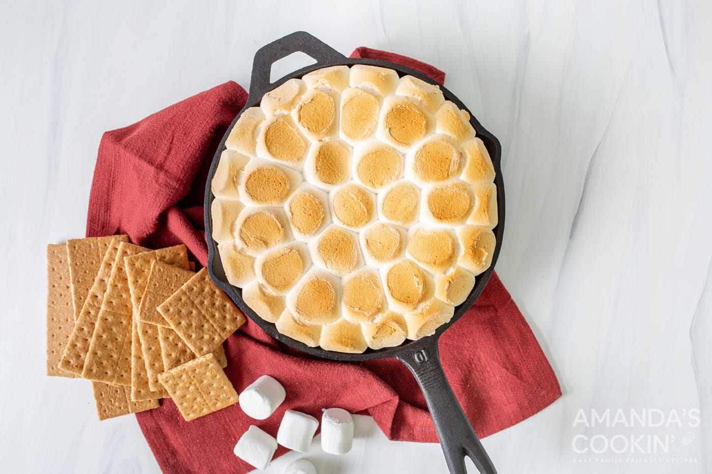 smores dip in a cast iron skillet overhead shot