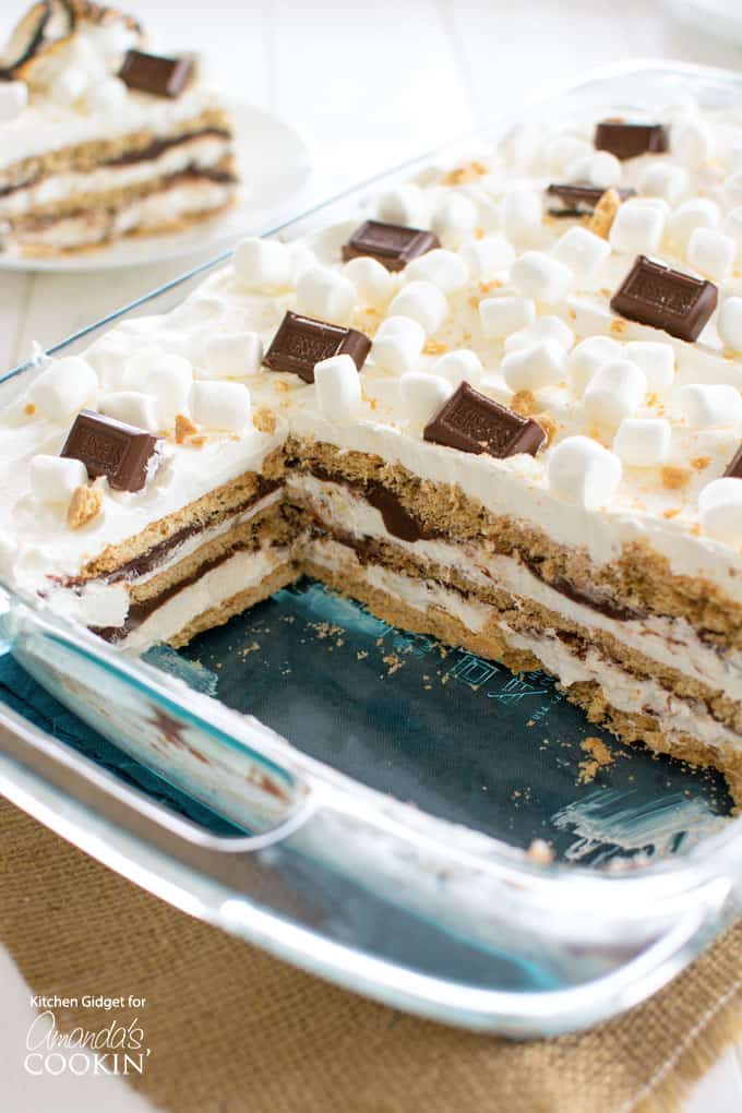 S'mores icebox cake in a dish with slices removed