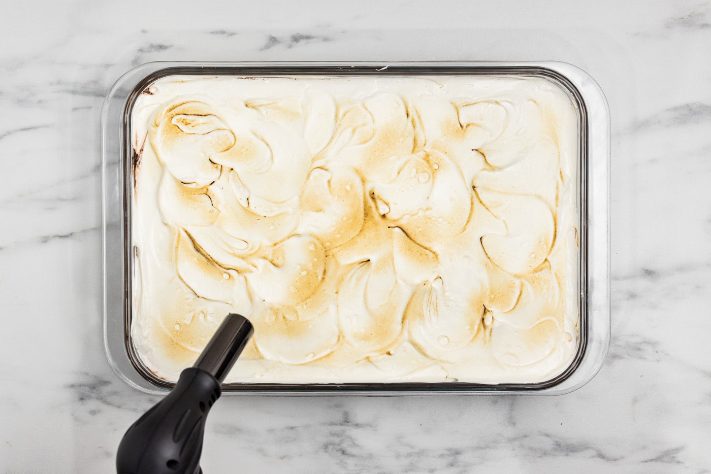 kitchen torch lightly browning marshmallow topping