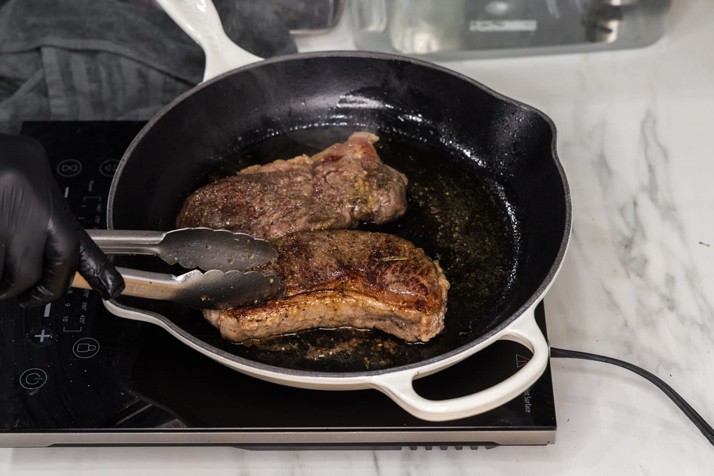 seared sous vide New York strip steaks