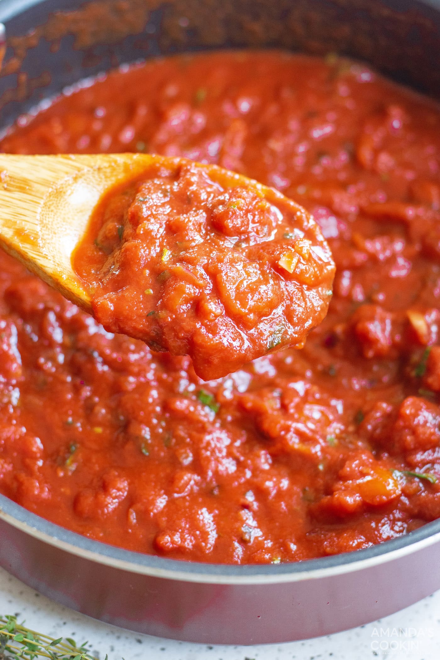 marinara on wooden spoon