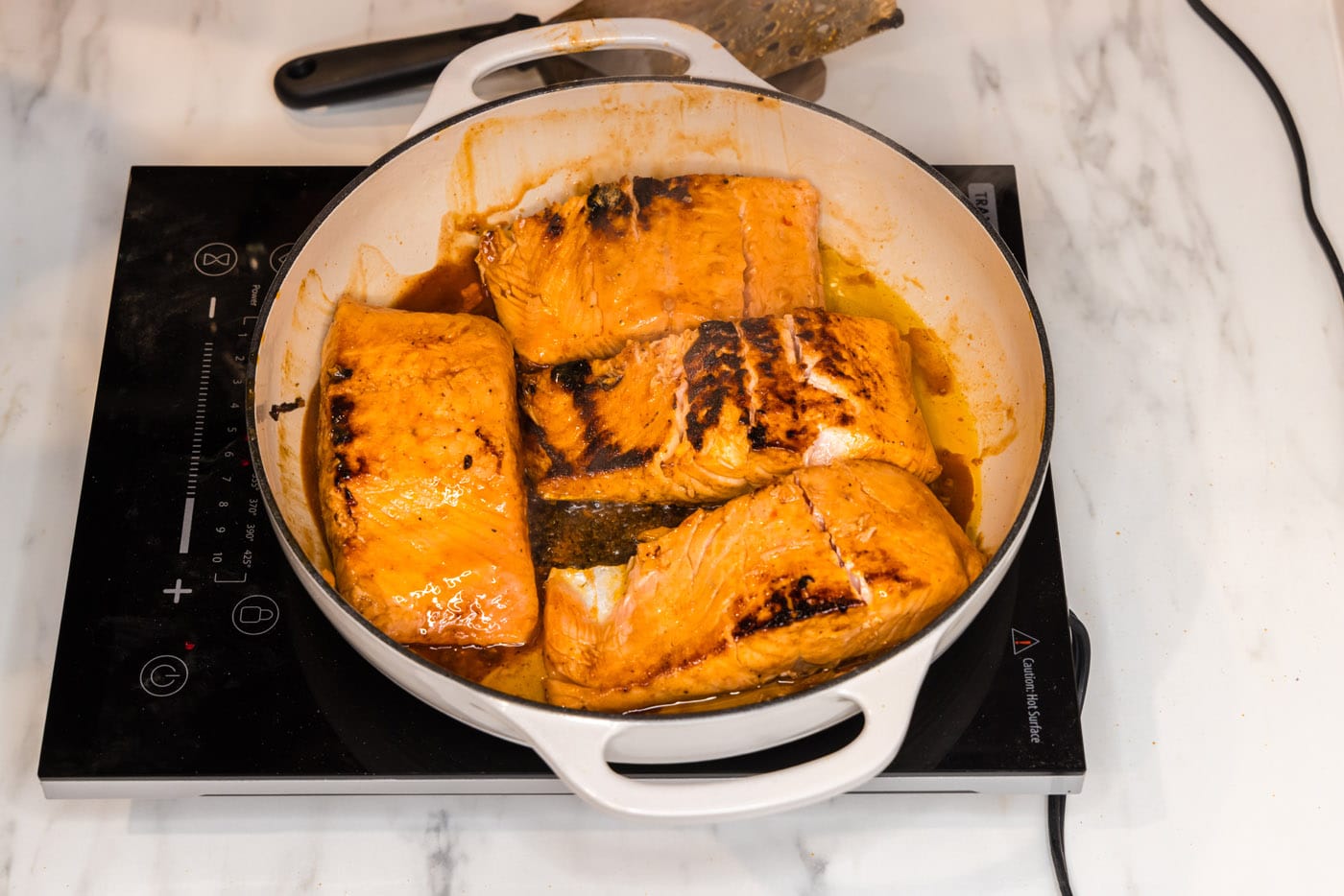 salmon filets in a skillet