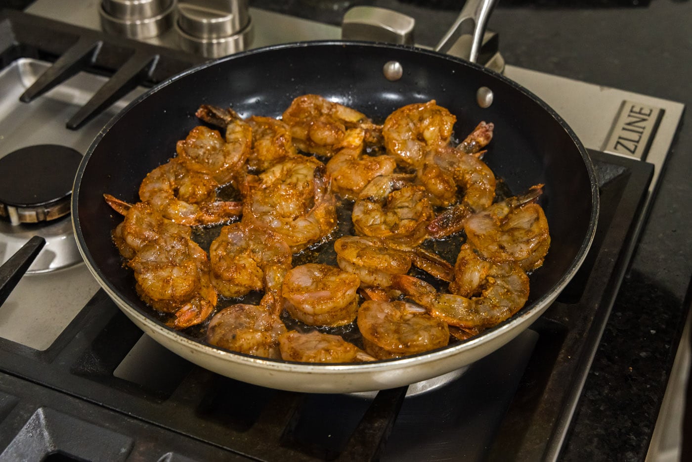 seasoned shrimp in a skillet