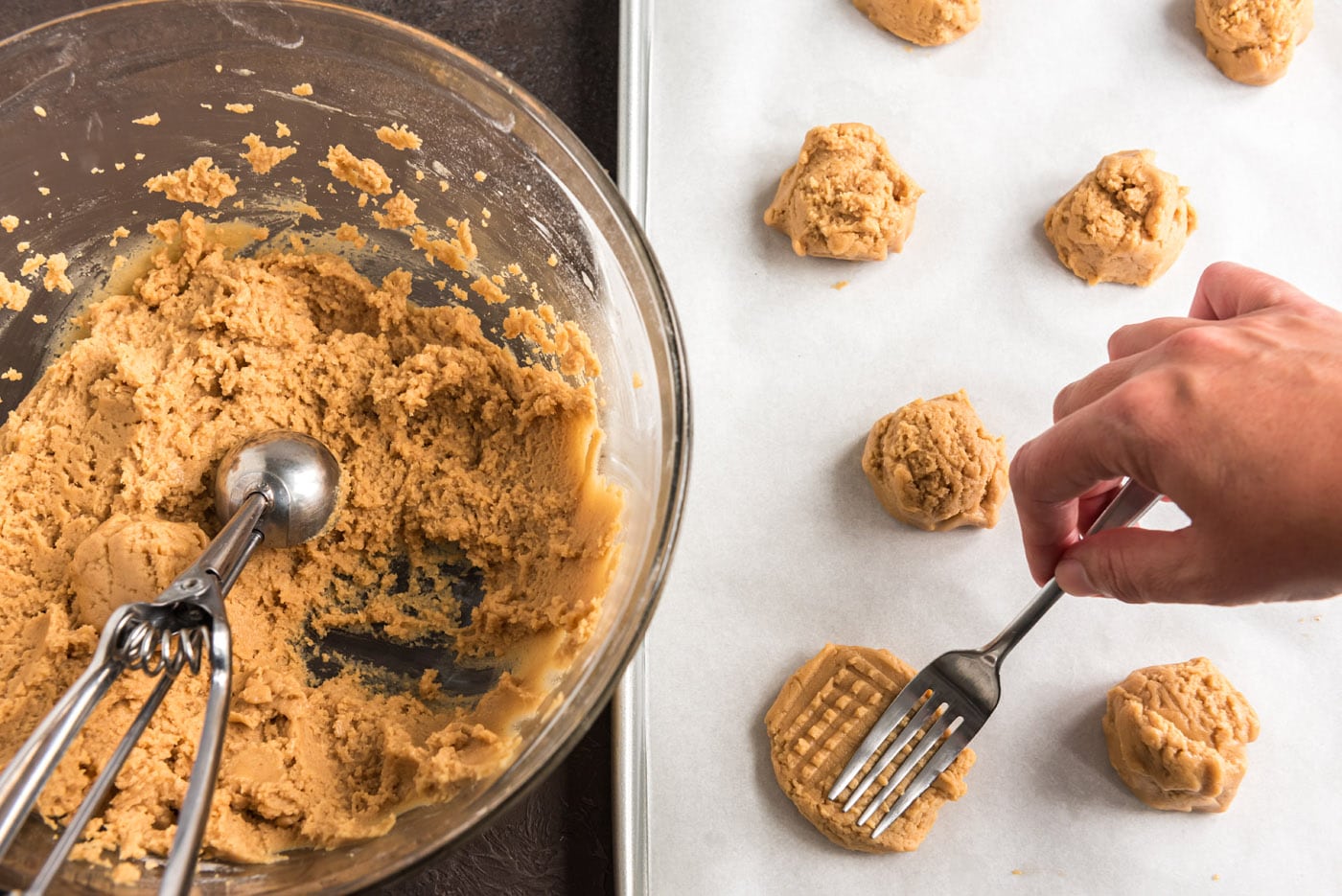 fork creating lines in cookie dough balls