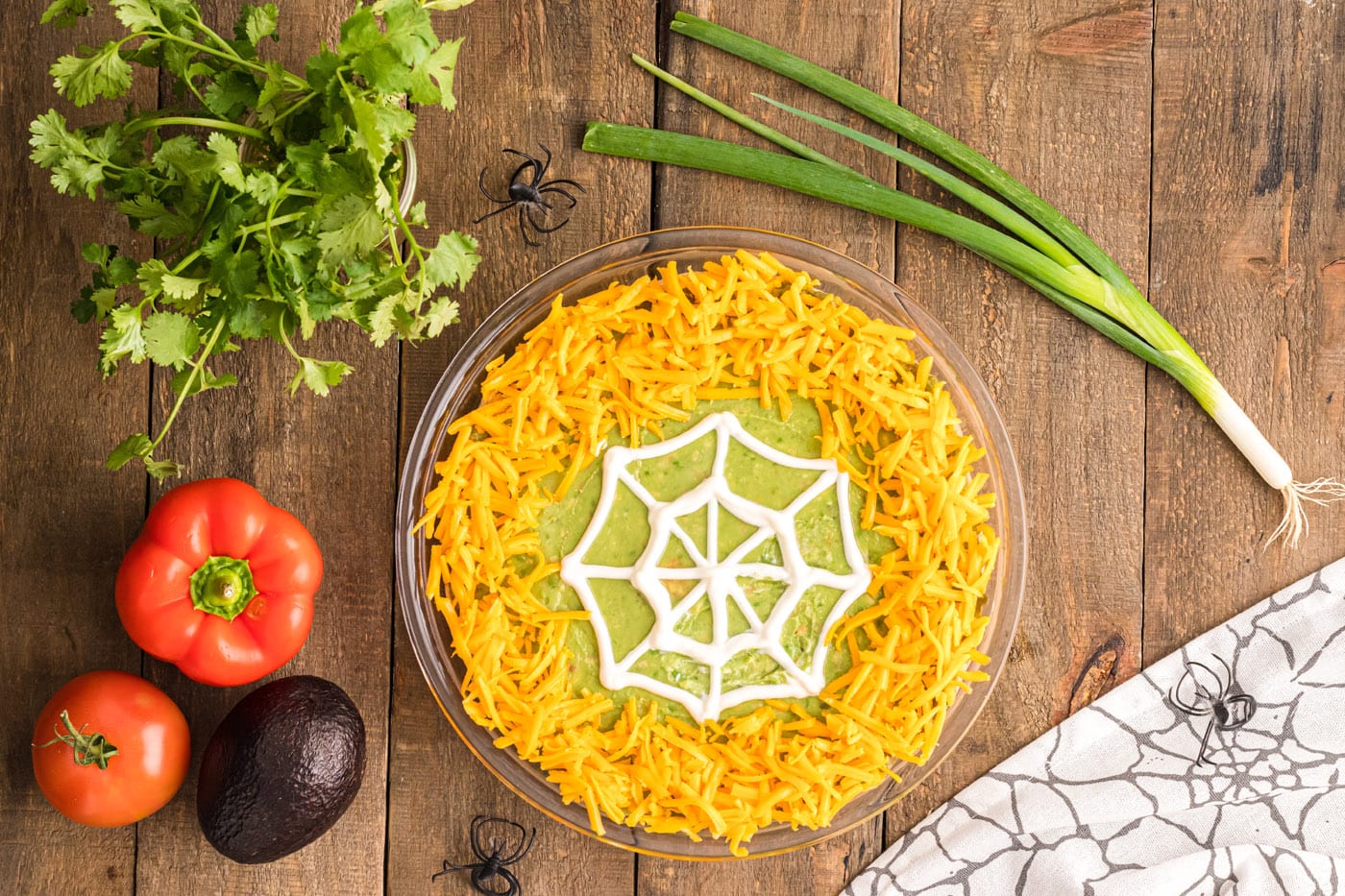 cheddar cheese around taco dip