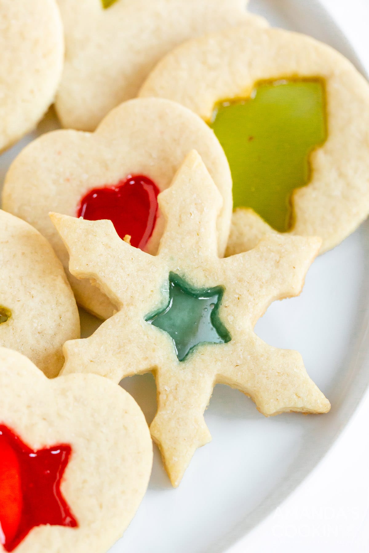 snowflake shaped stained glass cookie
