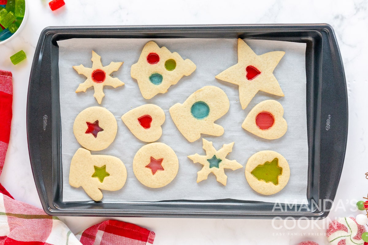 stained glass cookies on a baking sheet
