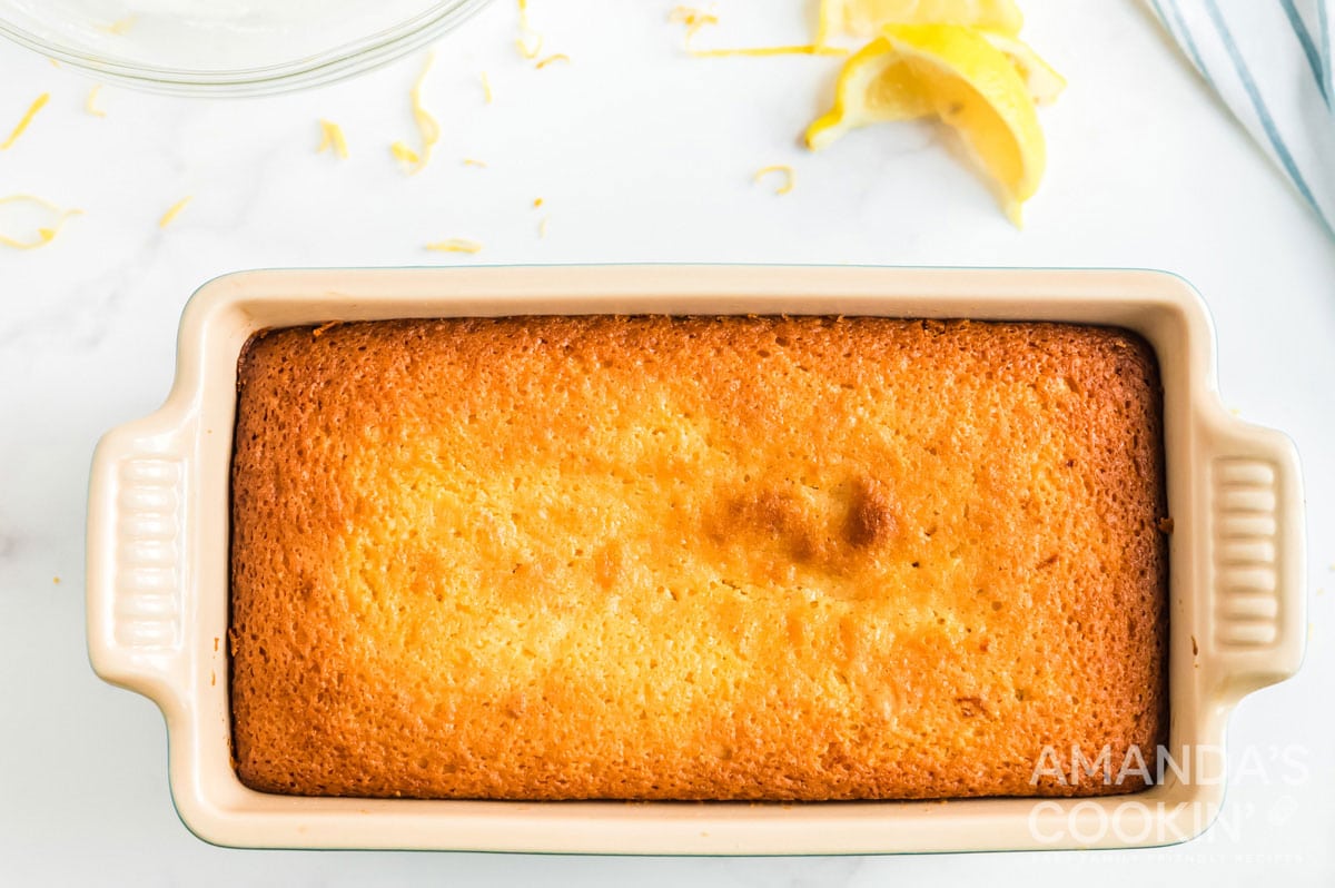 baked lemon loaf on loaf pan
