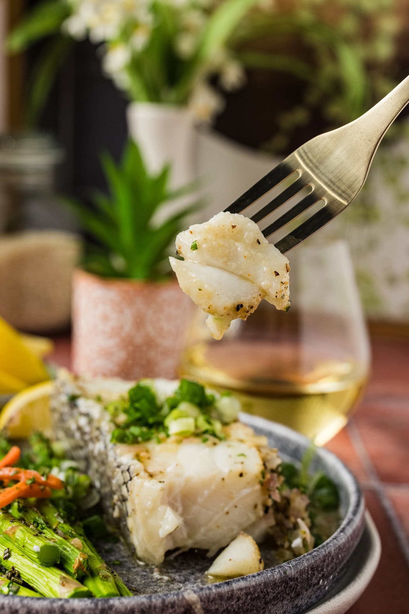 Piece of Steamed Chilean Sea Bass on a fork