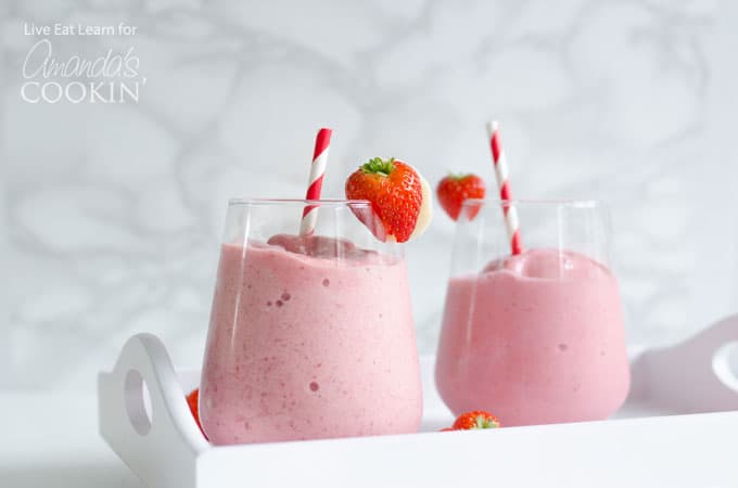 strawberry banana smoothies with strawberry garnish