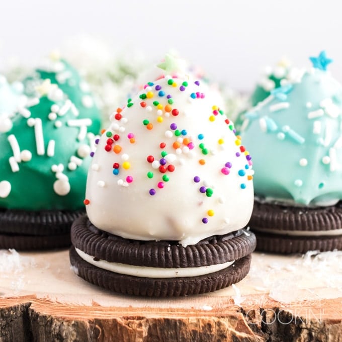 3 oreo cookies with chocolate covered strawberries