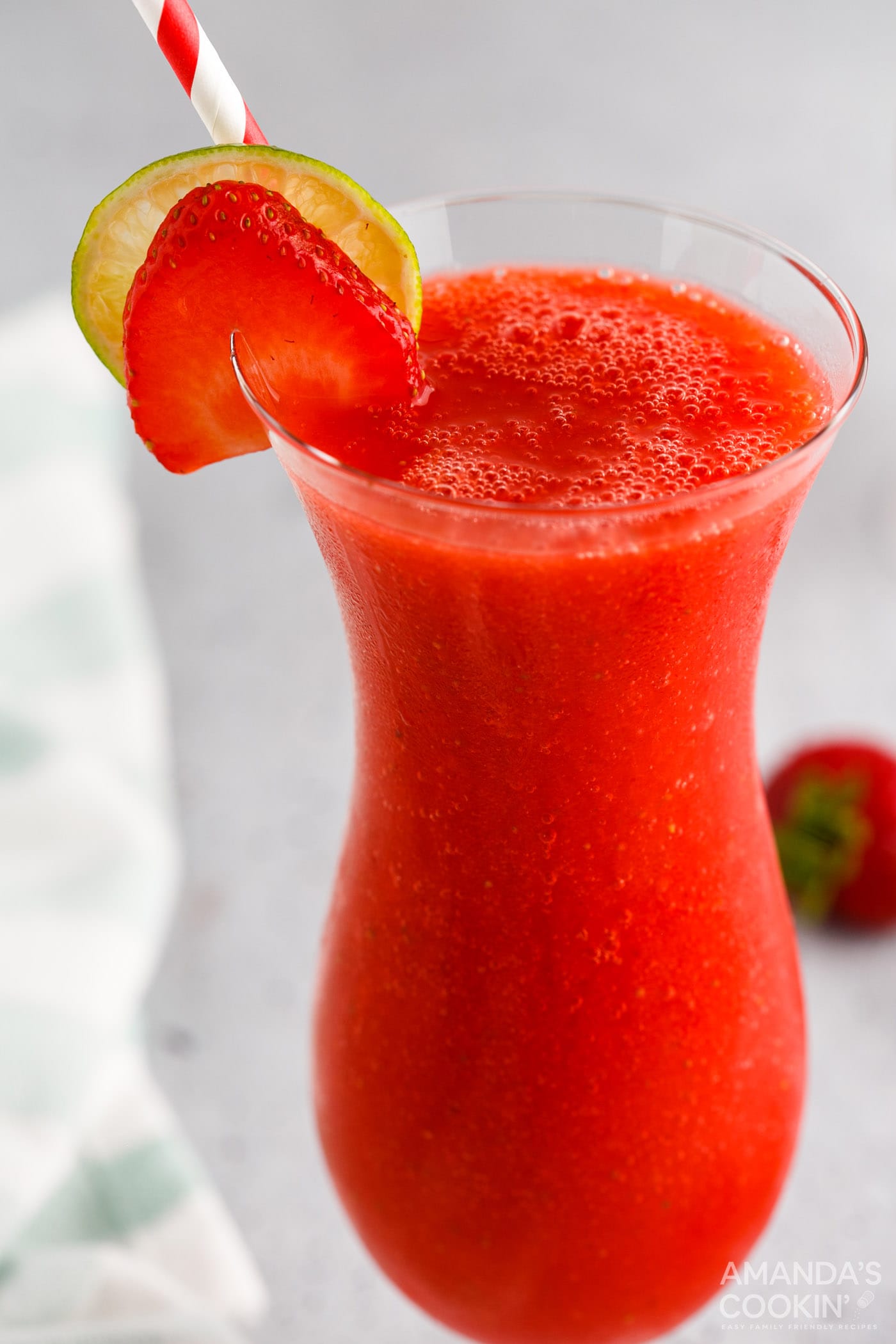 Strawberry Daiquiri with strawberry and lime garnish