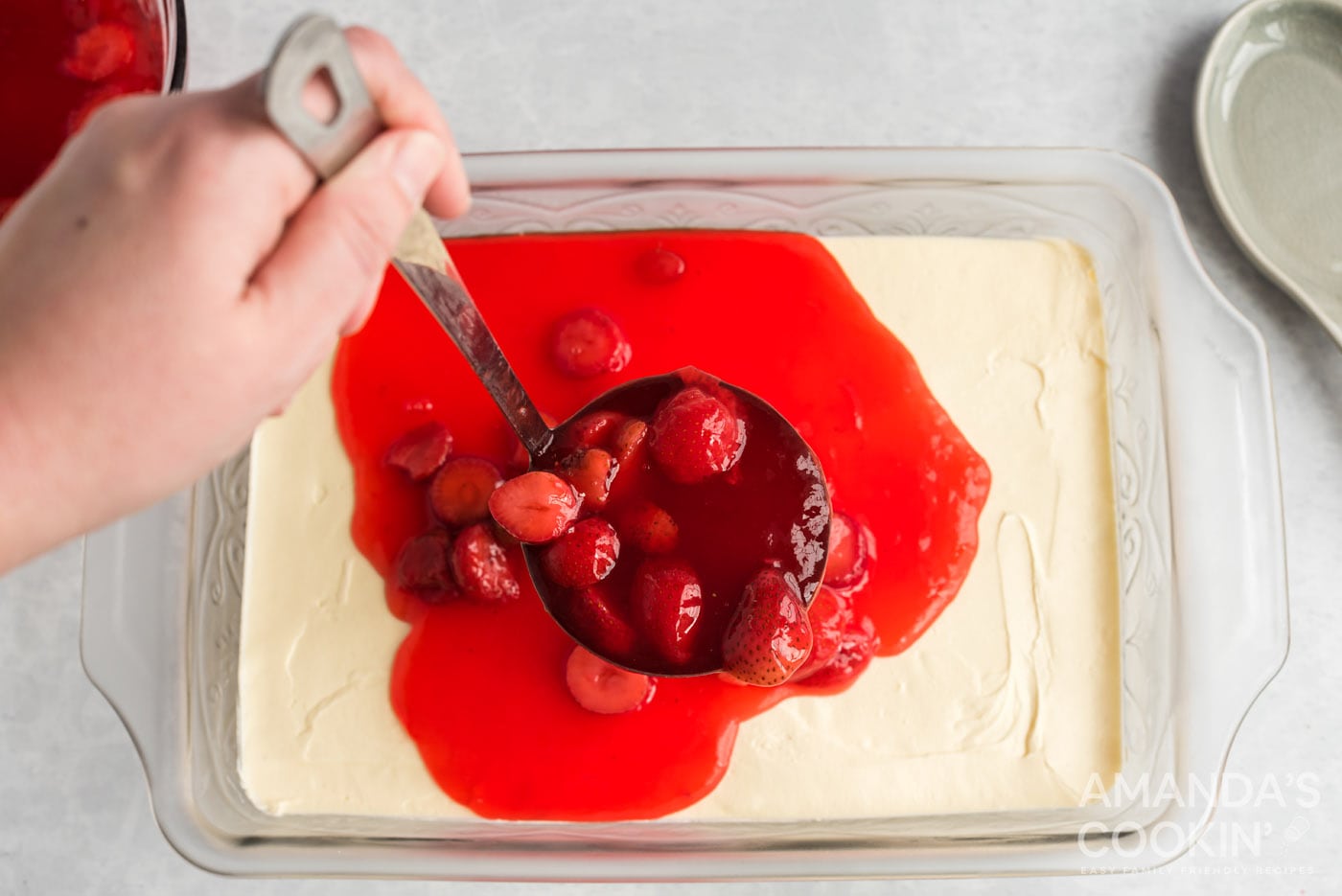 ladle with strawberry gelatin