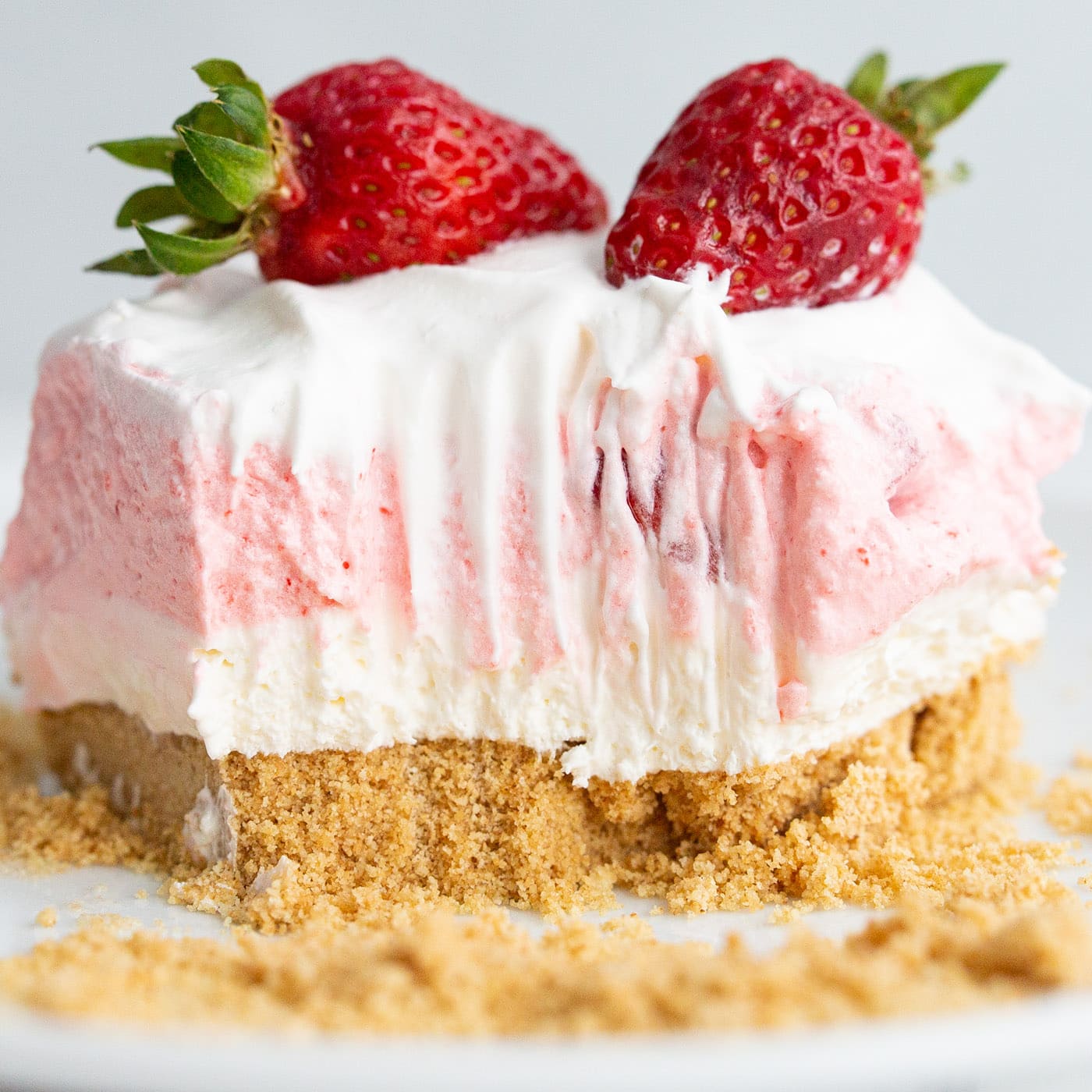 Close up photo of a piece of Strawberry Lasagna