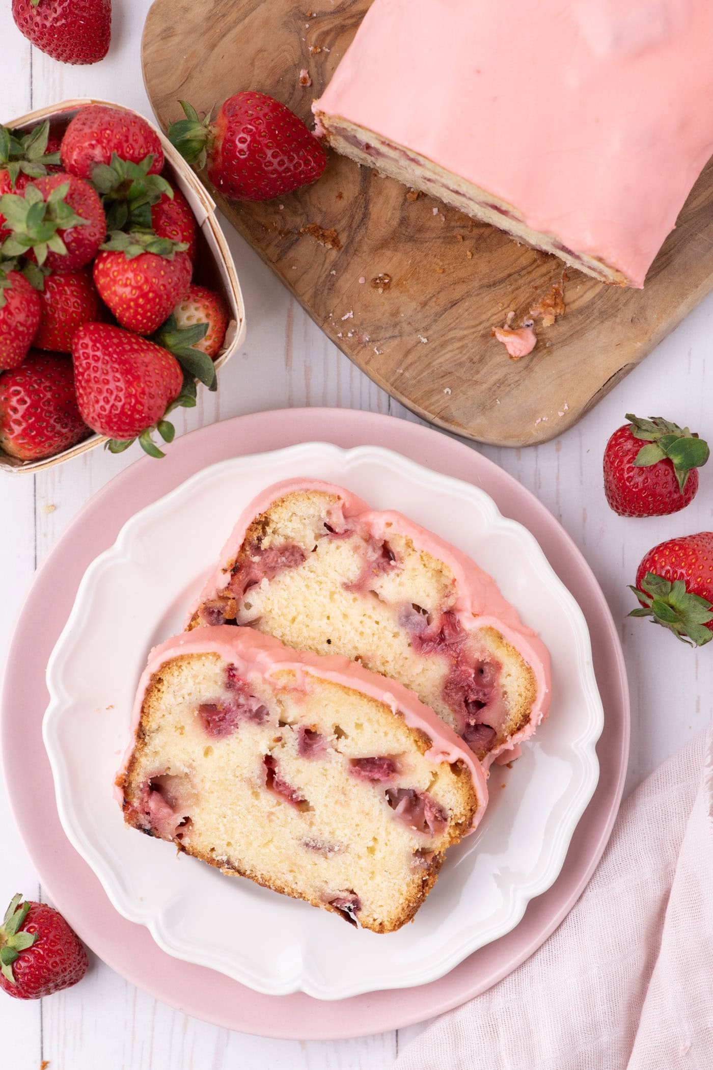 Two slices of Strawberry Pound Cake on a plate