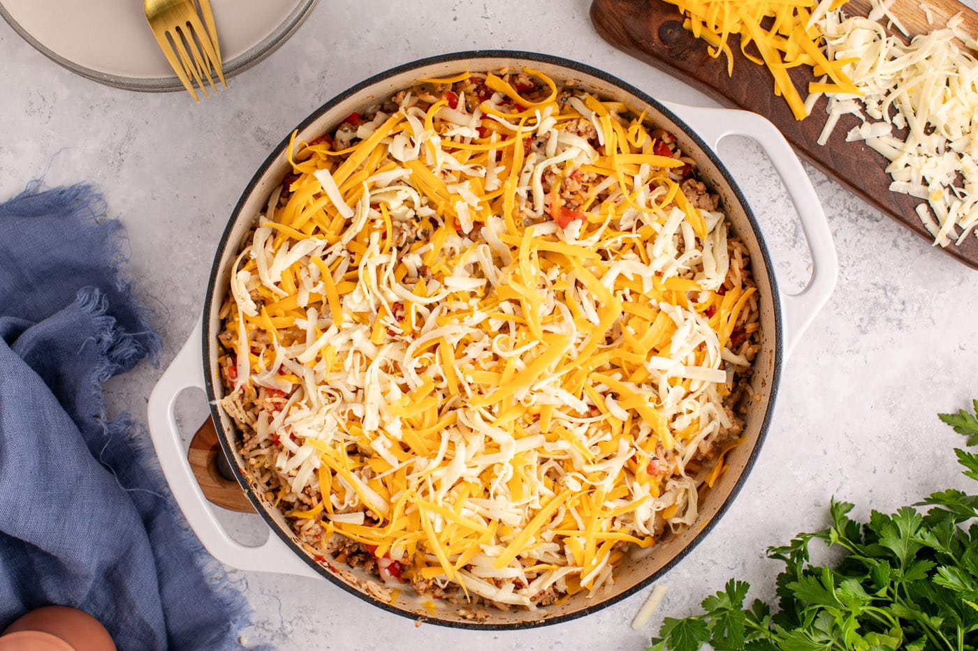 shredded cheese on top of stuffed pepper casserole