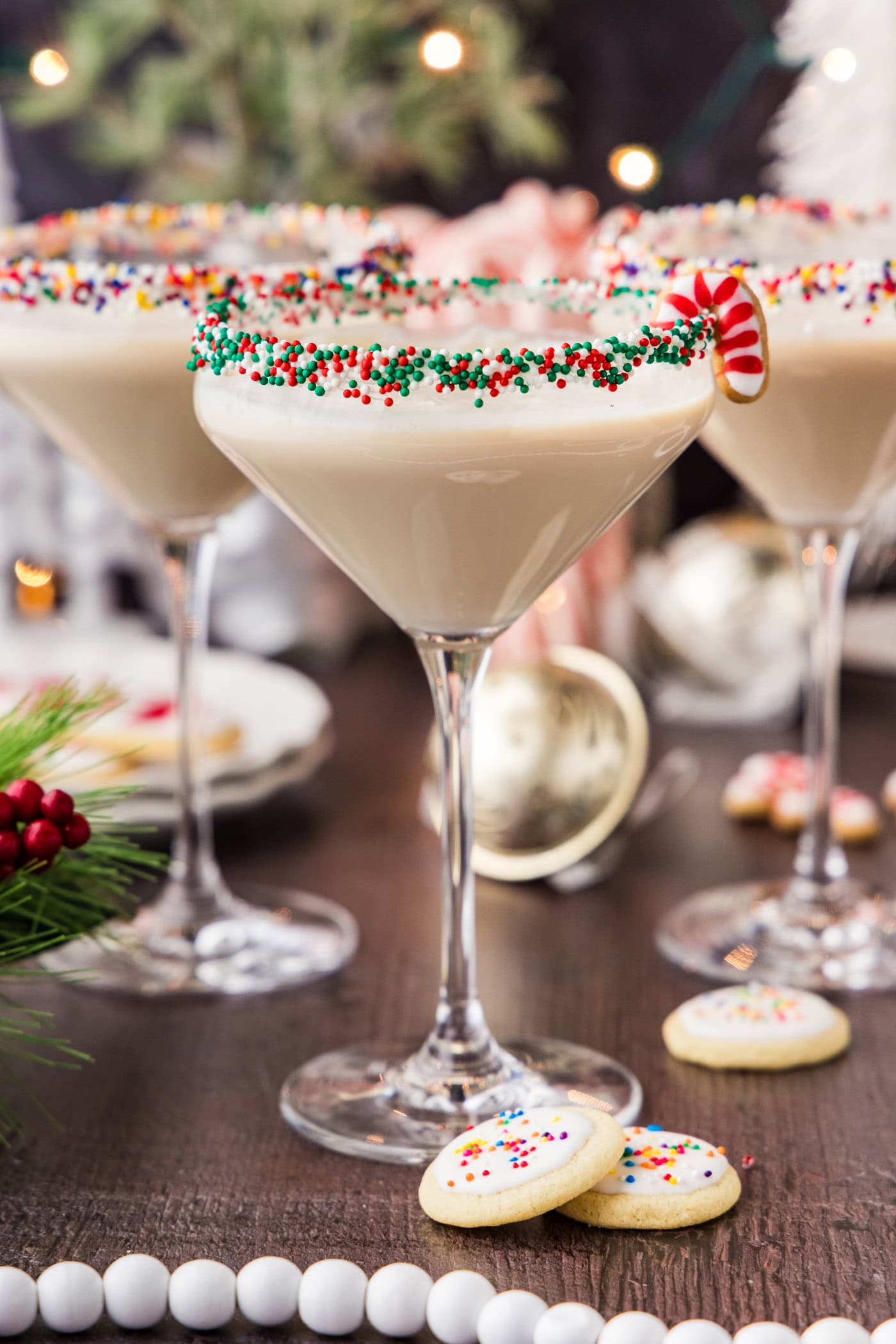 Three Sugar Cookie Martinis with mini sugar cookies next to them