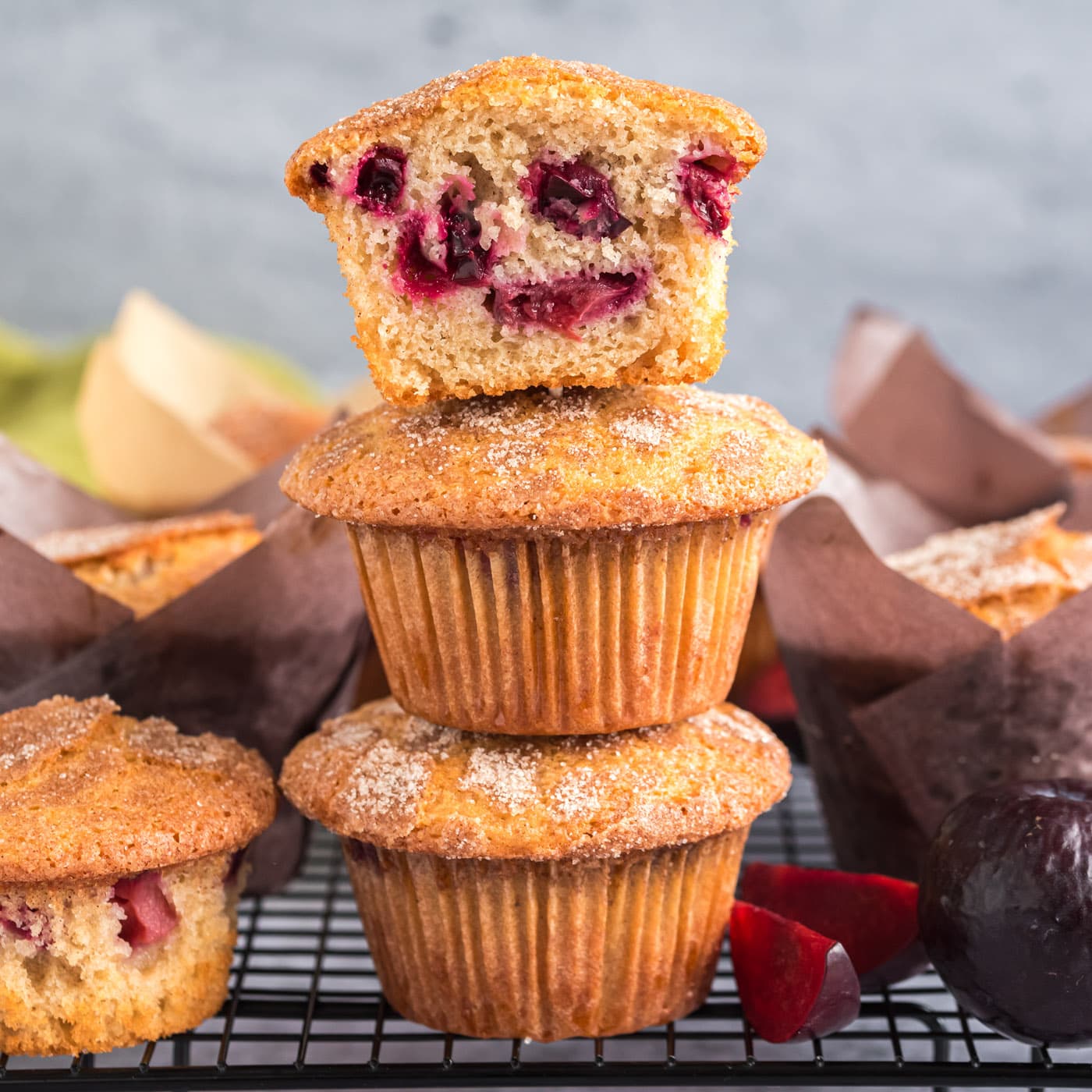 Stack of Sugar Crusted Plum Muffins