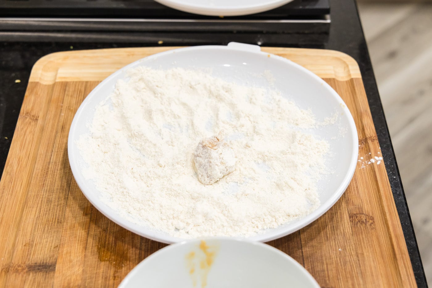 coating pork in flour