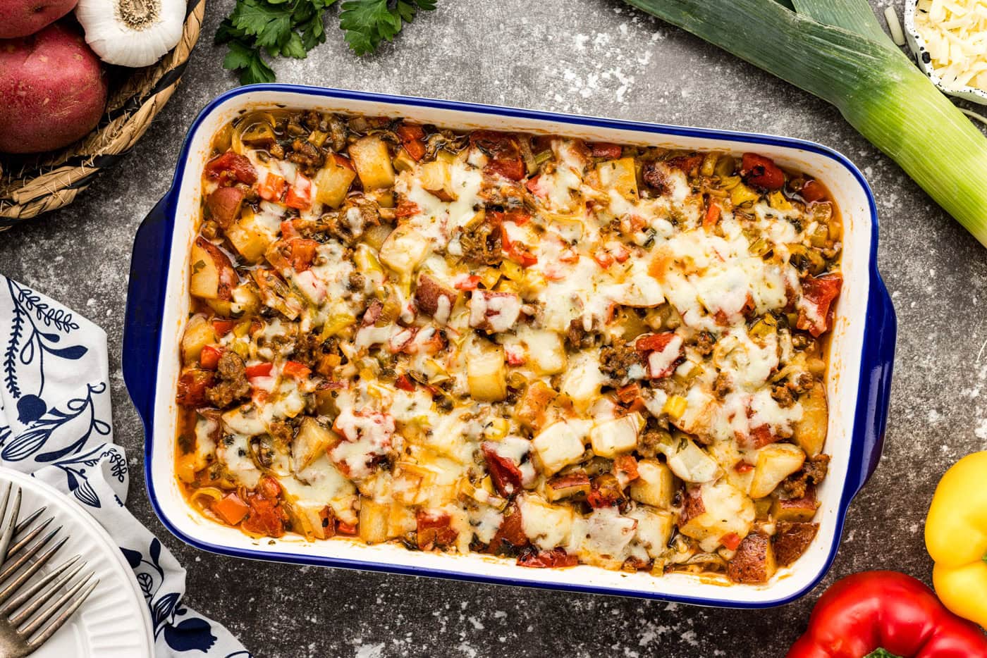 baked cheesy sausage and potato casserole overhead