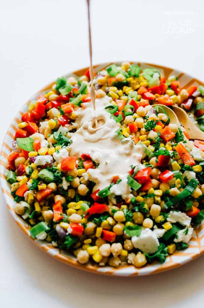 sweet corn and chickpea salad with dressing drizzle