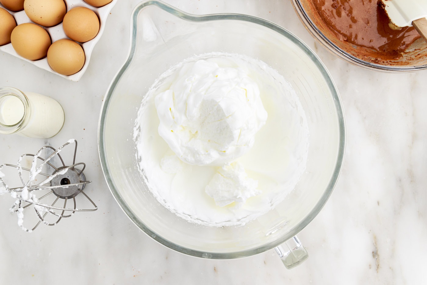 whipped egg whites in a mixer bowl