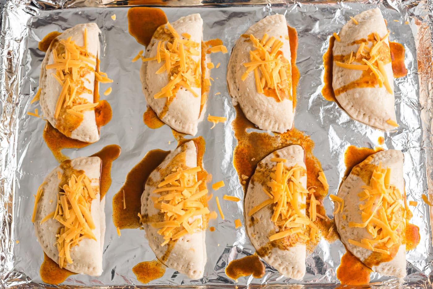 cheese on top of taco empanadas