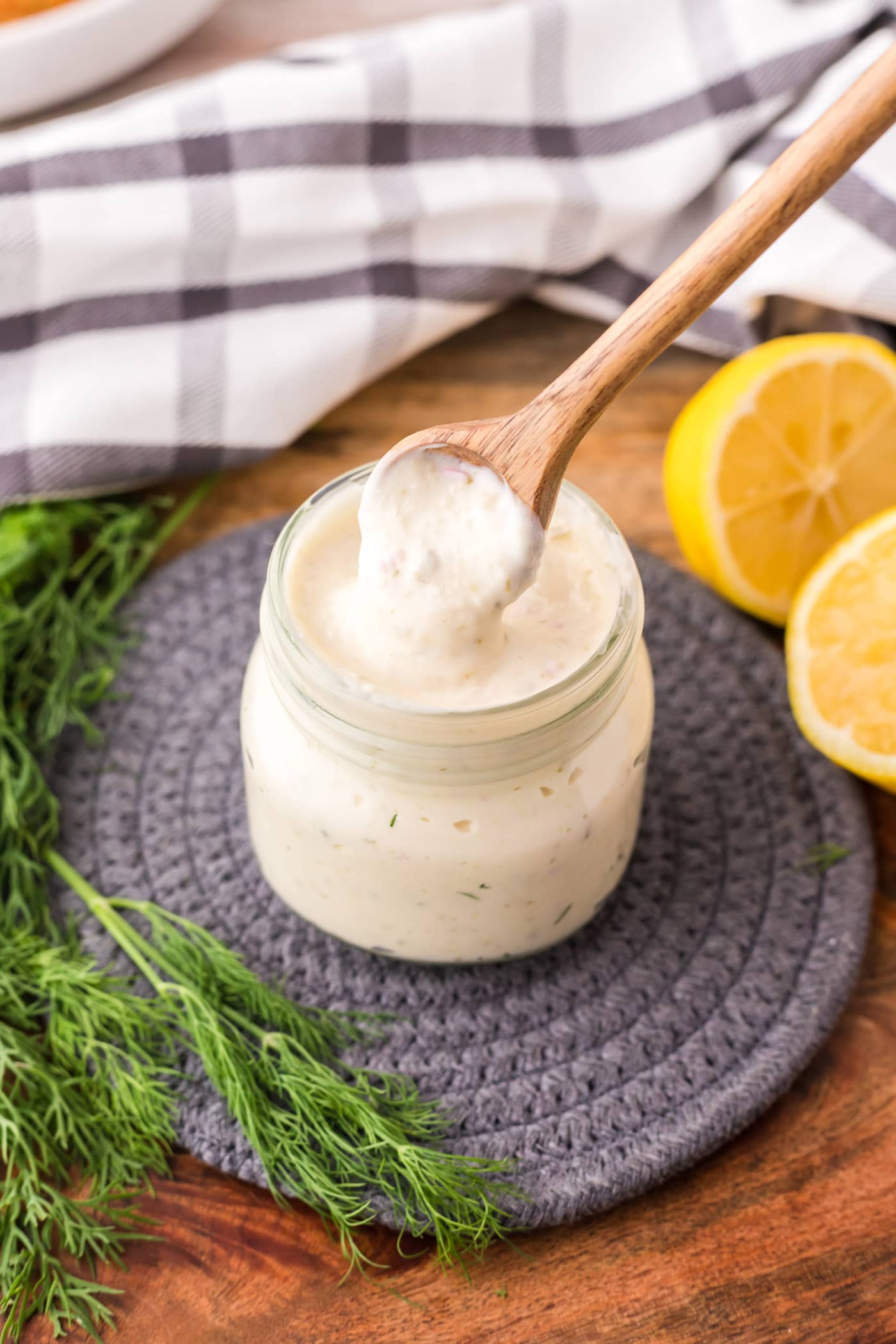 Spoonful of Tartar Sauce being taken out of the jar of Tartar Sauce
