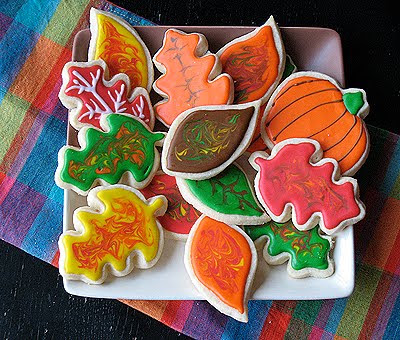 An overhead photo of an assortment of thanksgiving cookies resting on a plate.