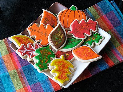 A photo of an assortment of thanksgiving cookies resting on a plate.