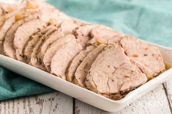 sliced roasted pork on a platter