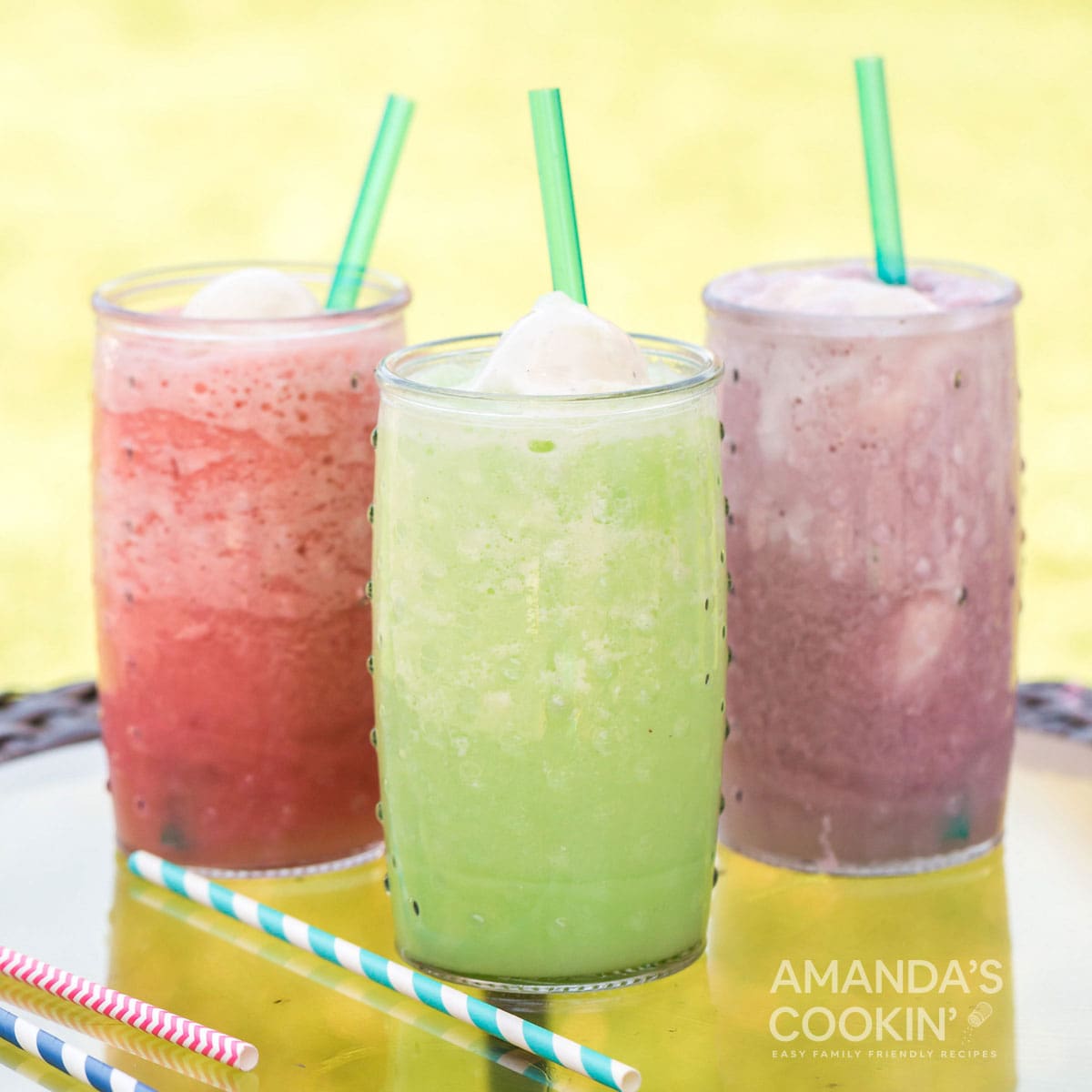 three slushies on a table