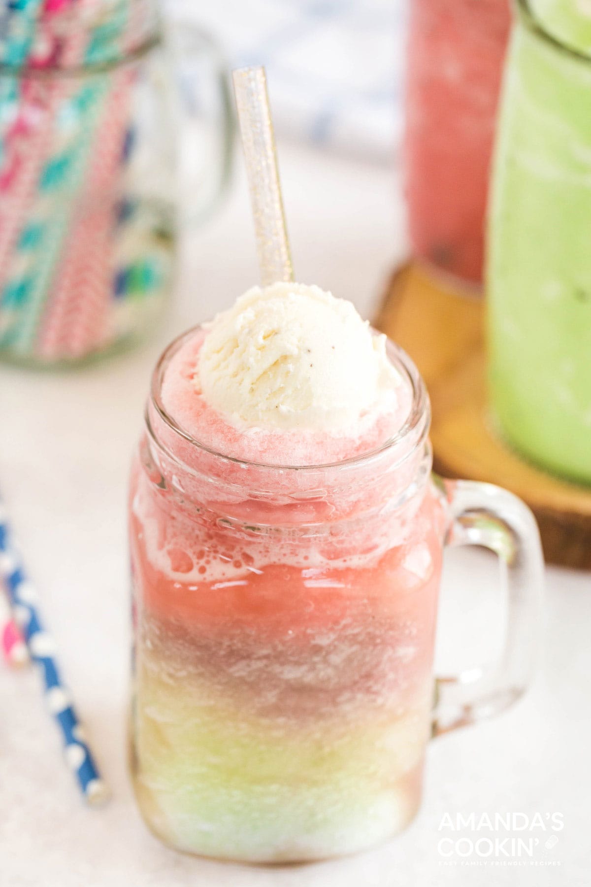 layered slushie float in a mason jar glass