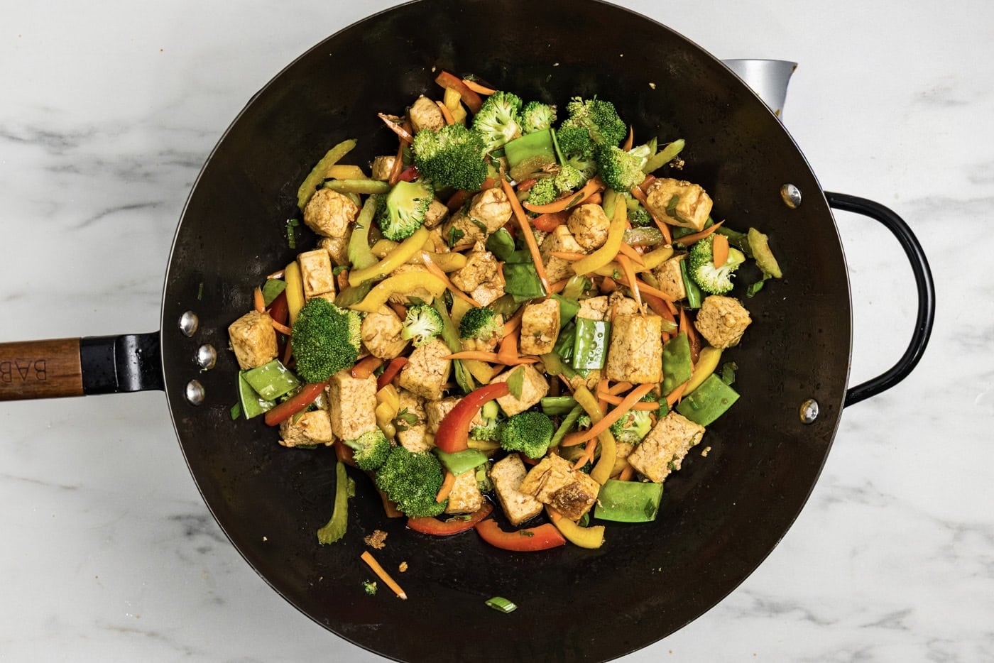cooked tofu stir fry in a wok
