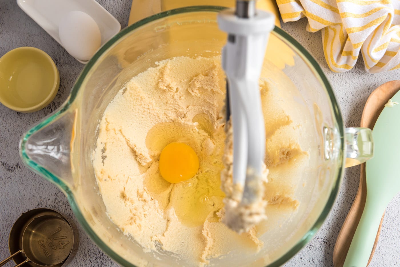 adding eggs to butter mixture