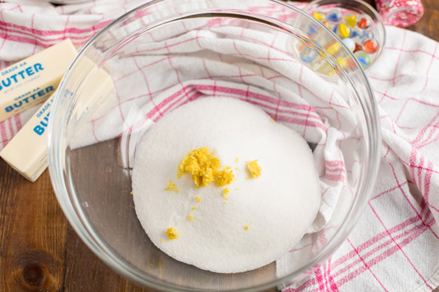 Sugar and lemon zest in a bowl