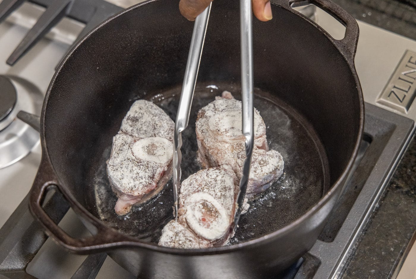 searing veal shanks in a dutch oven