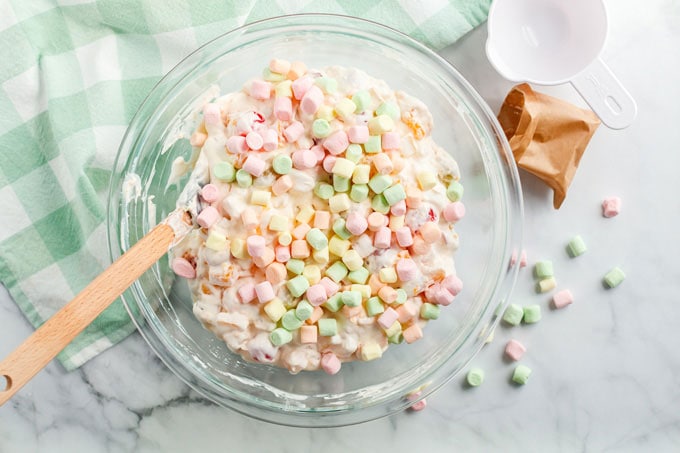 colorful miniature marshmallows over fruit cocktail