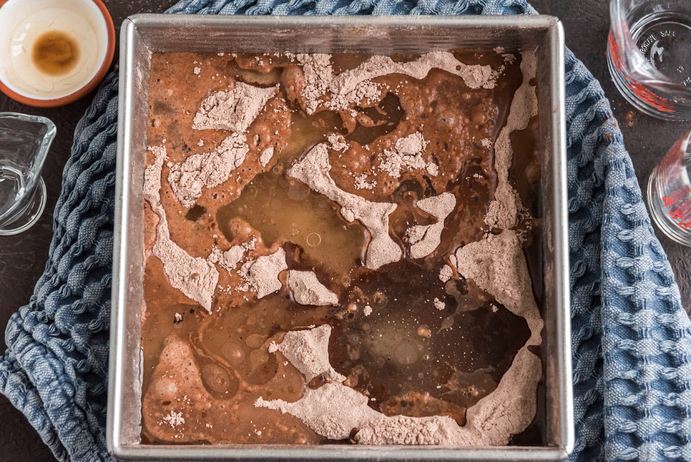 cold water poured over wacky cake ingredients
