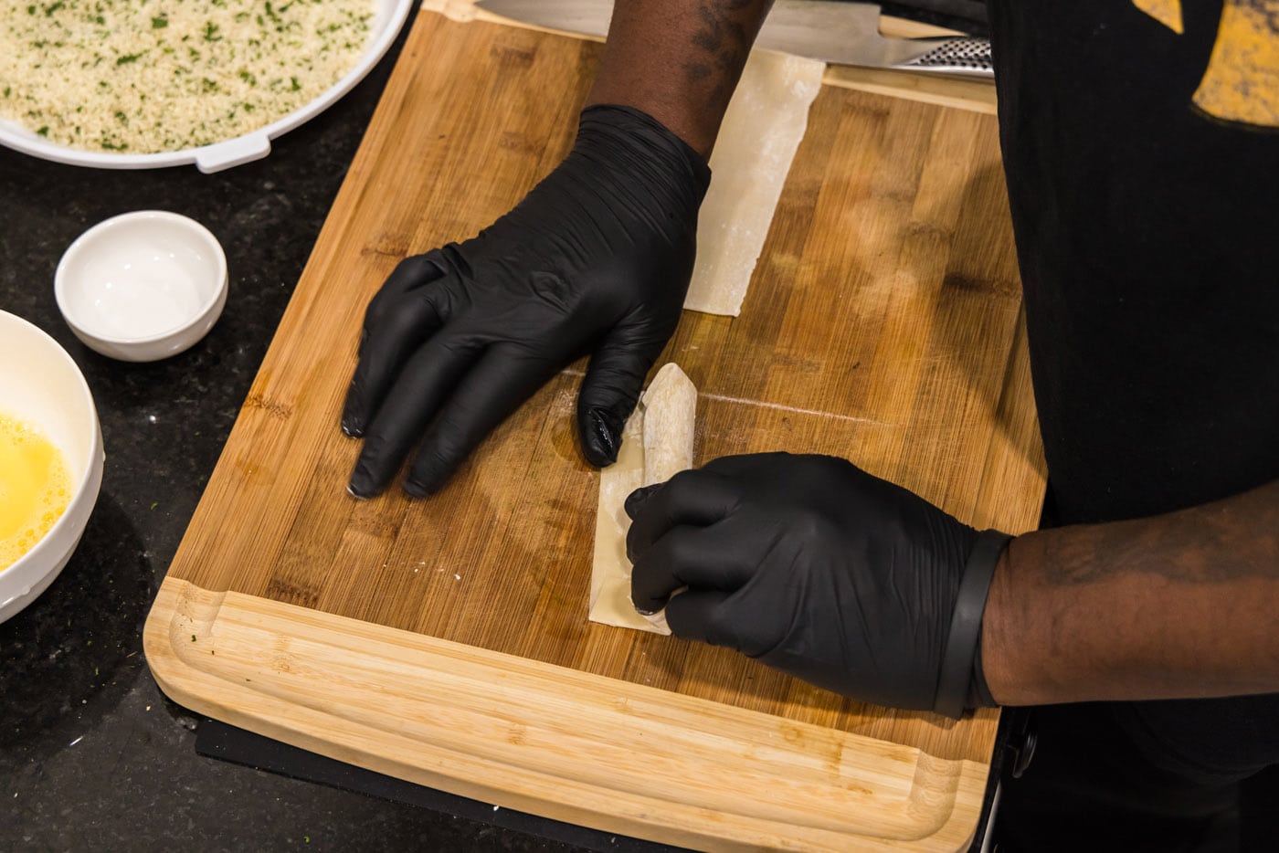 sealing string cheese inside and egg roll wrapper