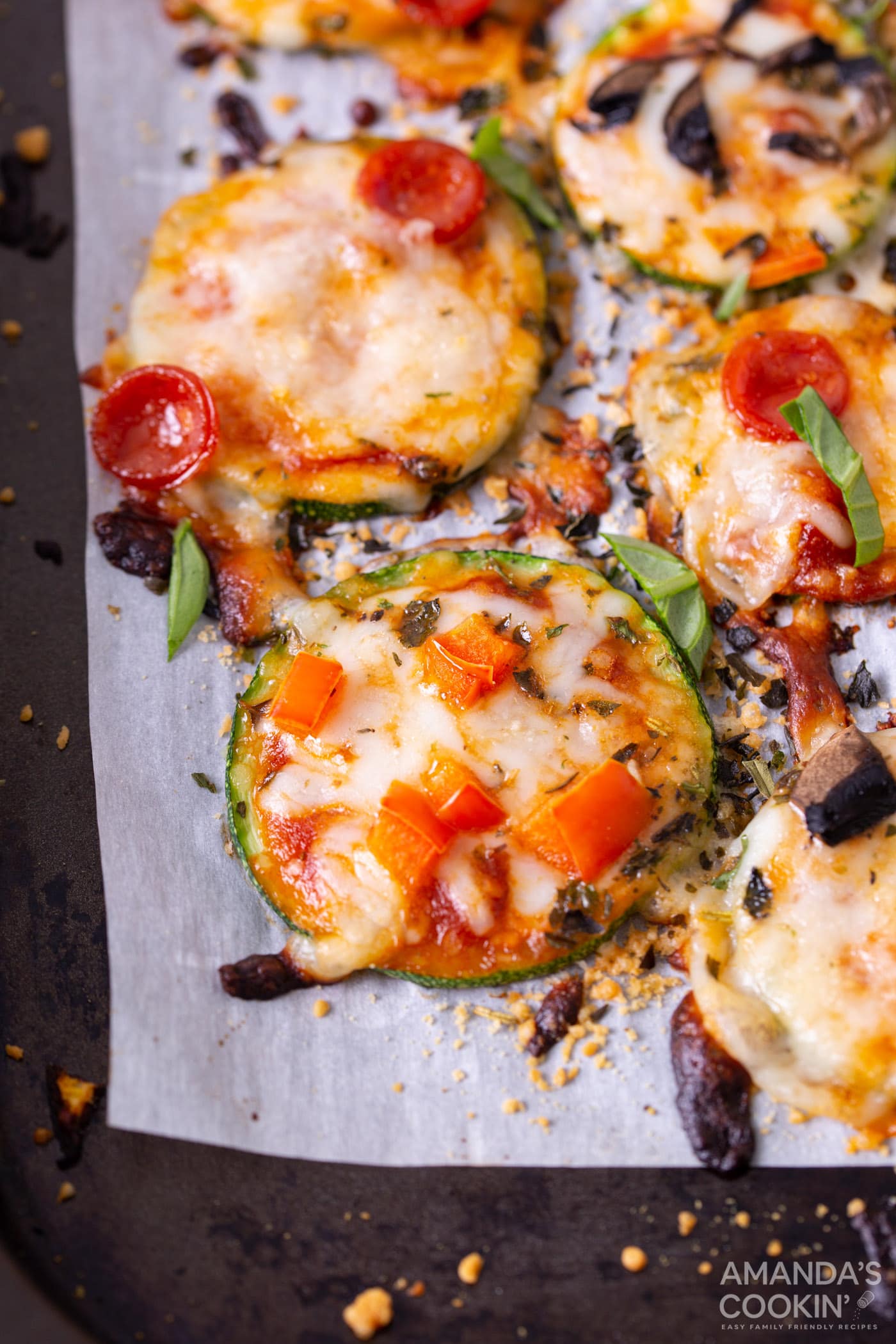 Zucchini Pizza Bites on parchment