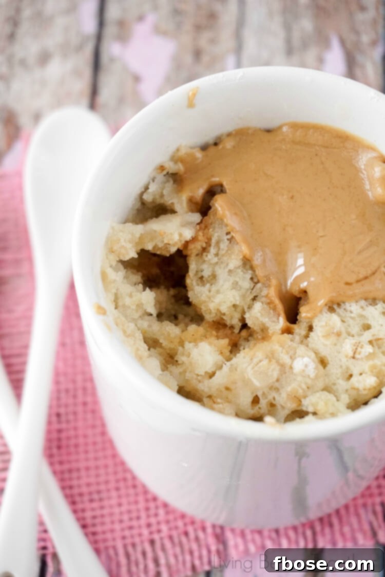 This Peanut Butter & Oatmeal Mug Cake for Two is a simple and fast fix for dessert or breakfast, a wholesome and comforting treat.