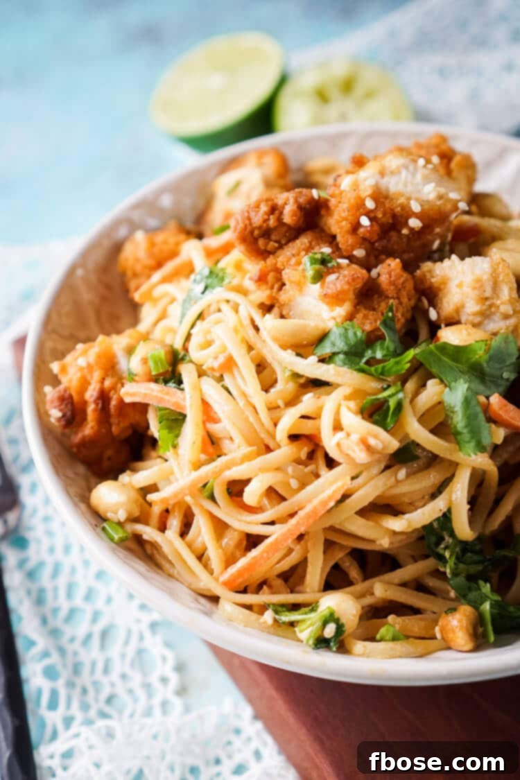 Delicious Crispy Chicken Thai Peanut Noodles, a perfect easy weeknight meal with crunchy chicken and creamy sauce.
