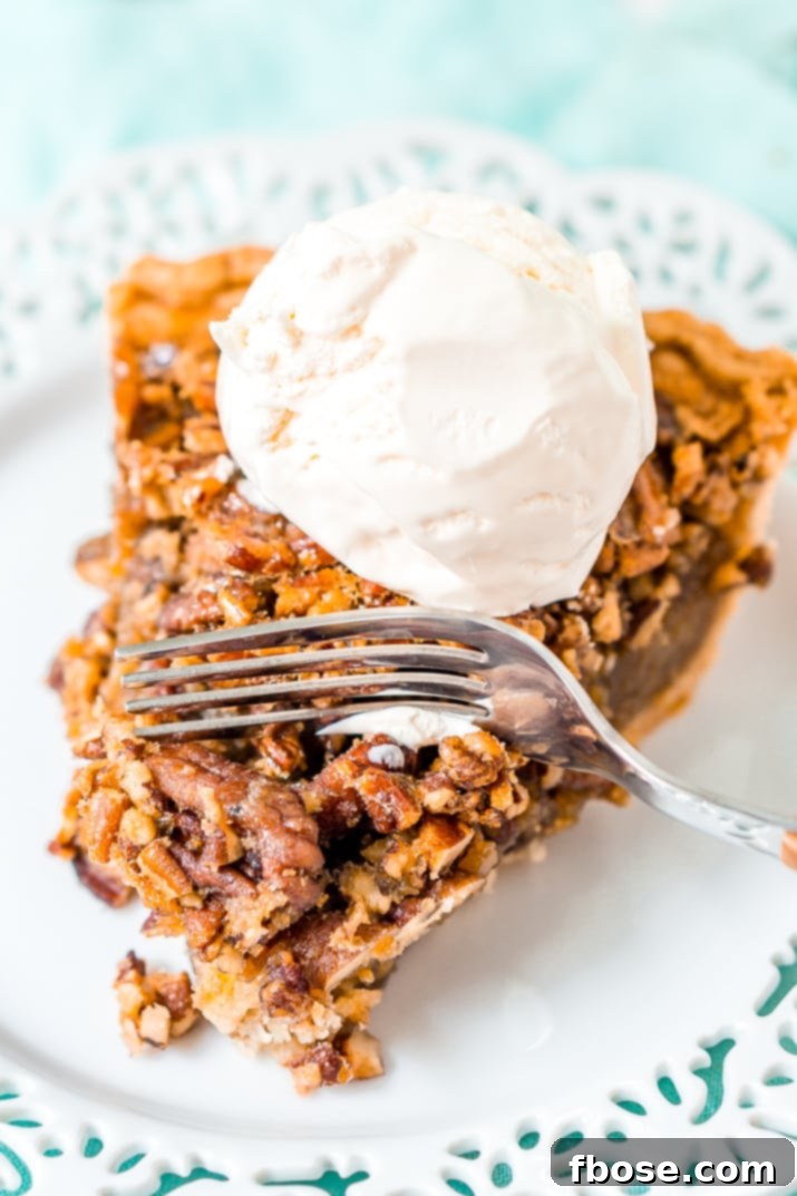 A close-up of the delicious pecan pie filling.