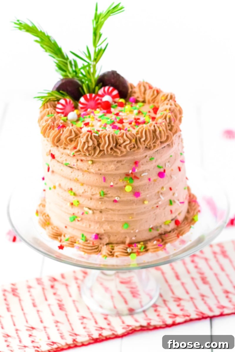 This Peppermint Cocoa Cake is rich, moist, and chocolaty with a whipped cream frosting that's laced with peppermint!