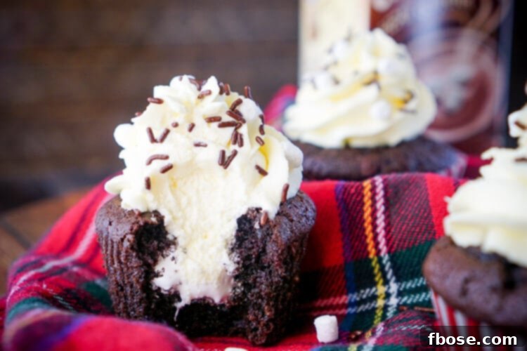 Cozy Cocoa Cupcakes 5 A spread of Hot Chocolate Cupcakes ready to be served, highlighting their festive appearance with sprinkles