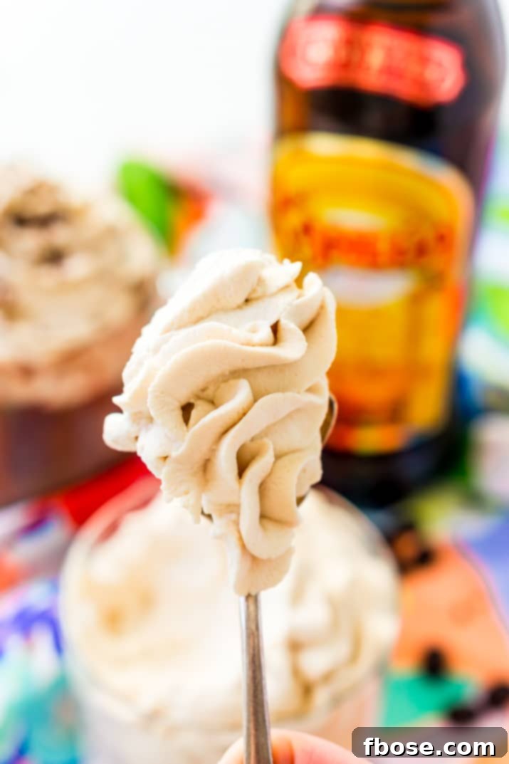 Spoonful of Kahlua Whipped Cream ready to be savored
