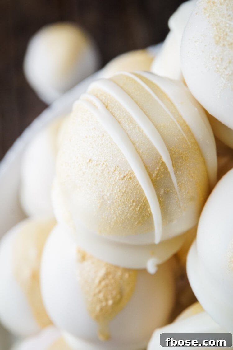 These Champagne Cake Balls are infused with the delightful flavors of strawberries and champagne, making them ideal for New Year's Eve, Valentine's Day, and bridal showers. They're a crowd-pleasing, easy dessert.