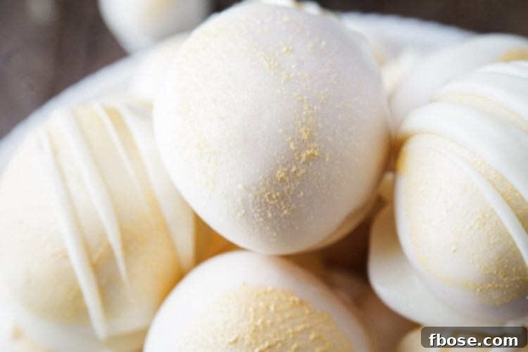 Add a touch of edible gold shimmer to your Strawberries & Champagne Cake Balls with Wilton pearl dust, turning them into elegant, hand-painted masterpieces for any festive occasion.