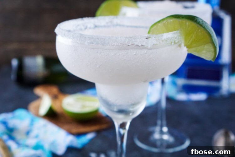 These Frozen Champagne Margaritas are a fun blend of silver tequila, bubbly champagne, limes, and ice! They're perfect for New Year's Eve, Cinco de Mayo, or any occasion where you just want a cocktail that's refreshing and delicious! 